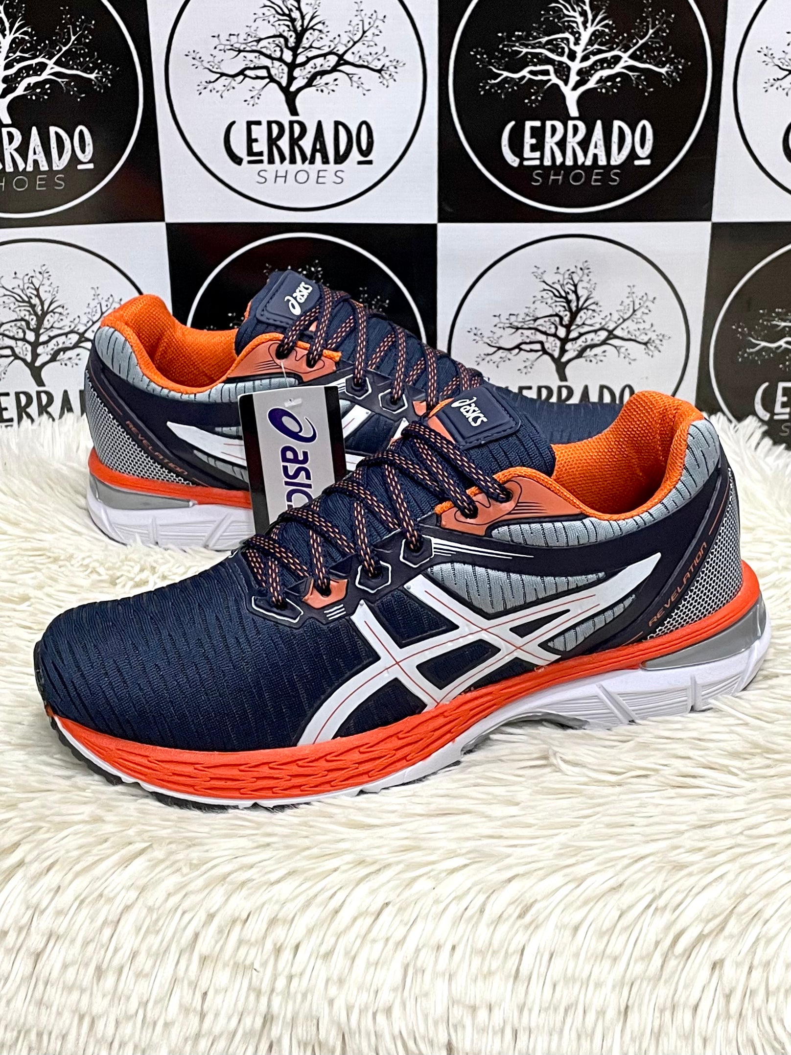 Asics Revelation 1 Marinho c/ Laranja